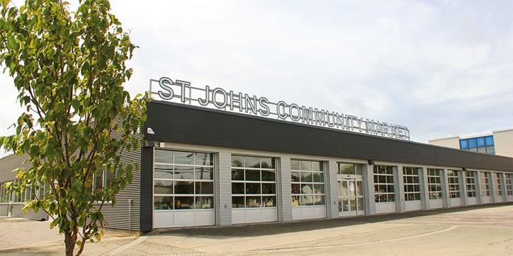 Exterior view of st. john's community center on a clear day.
