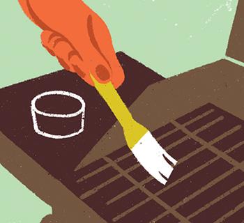 An illustration of a person using a brush to clean a grill.
