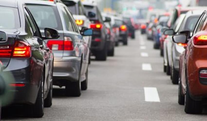 A traffic jam of cars on a busy road.