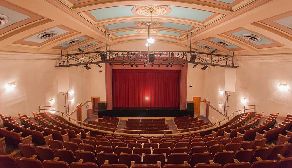 A large auditorium with rows of seats.