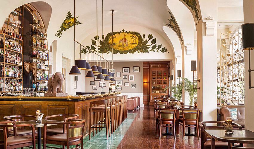 The interior of a restaurant with a bar.