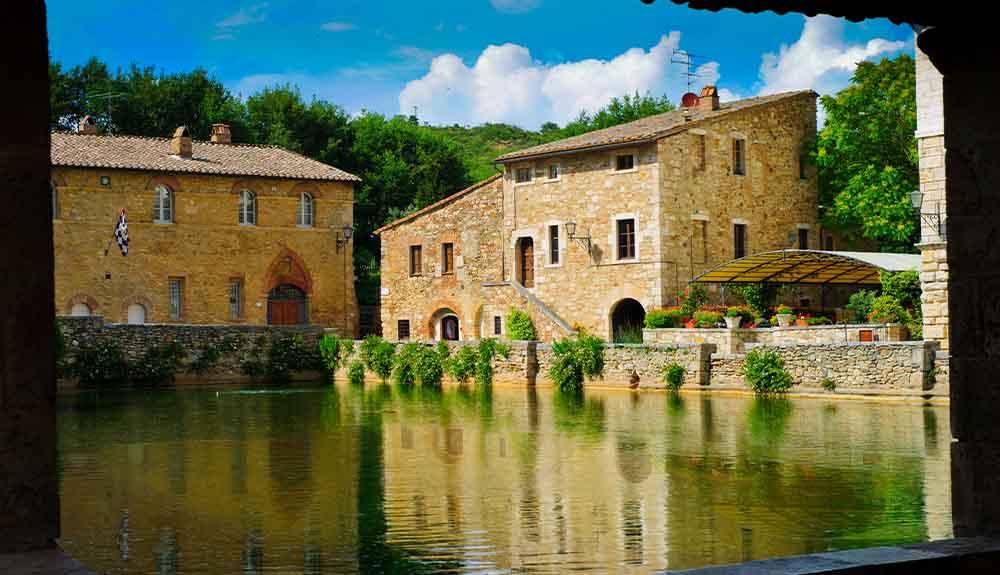 A view of a pond in an old building.