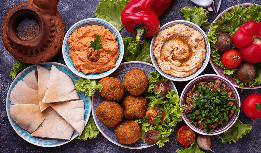 A group of bowls of food.