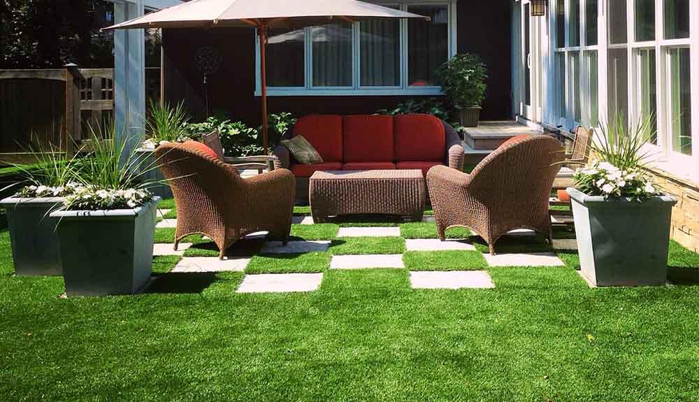 Artificial grass in a backyard.