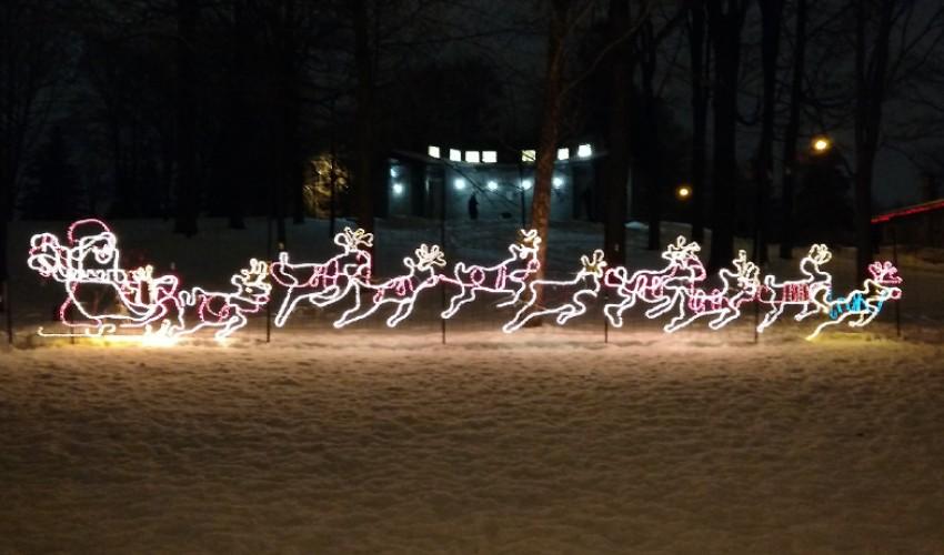 Santa's sleigh and reindeer in the snow.