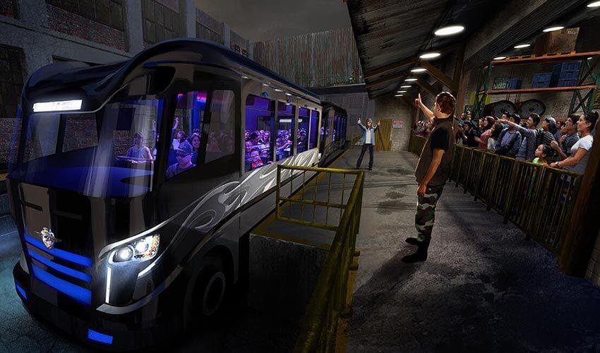 A group of people are standing in front of a bus.