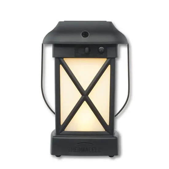 A black lantern with a light on it.
